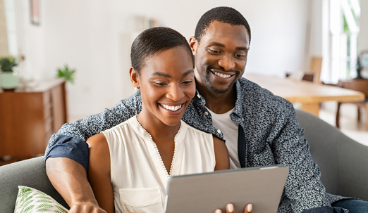 Couple using the computer
